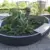 Maatwerk plantenbak met houten zitvlakken
