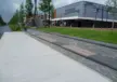 Kaimauer mit Holzsitzauflagen Dorfzentrum Stadskanaal