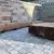 Kalchreut Pure Bank Podest Hocker Rückenlehne Corten 4 Grijsen Stadtmobiliar