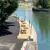 Wien Donaukanal Aspernbrücke Holzpodest mit Notaris Liegen Montage 23 25 06 2026 2